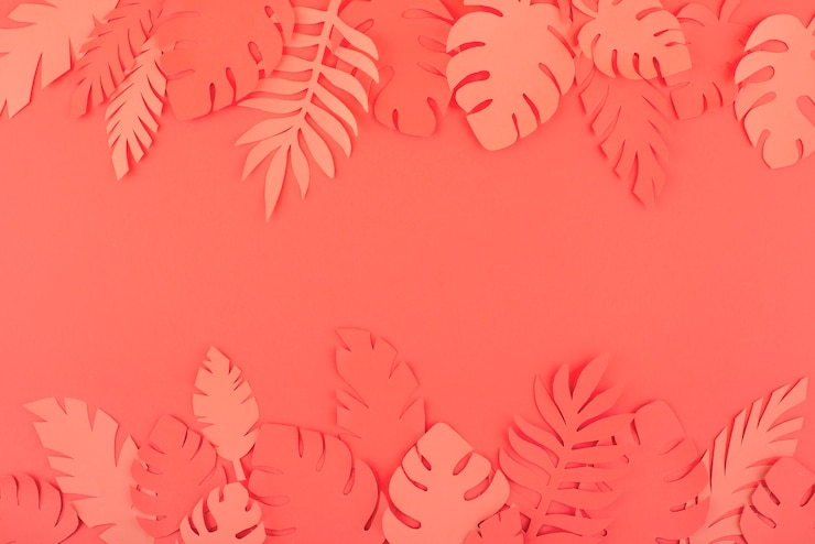 Photo gratuit feuilles de papier sur fond de corail