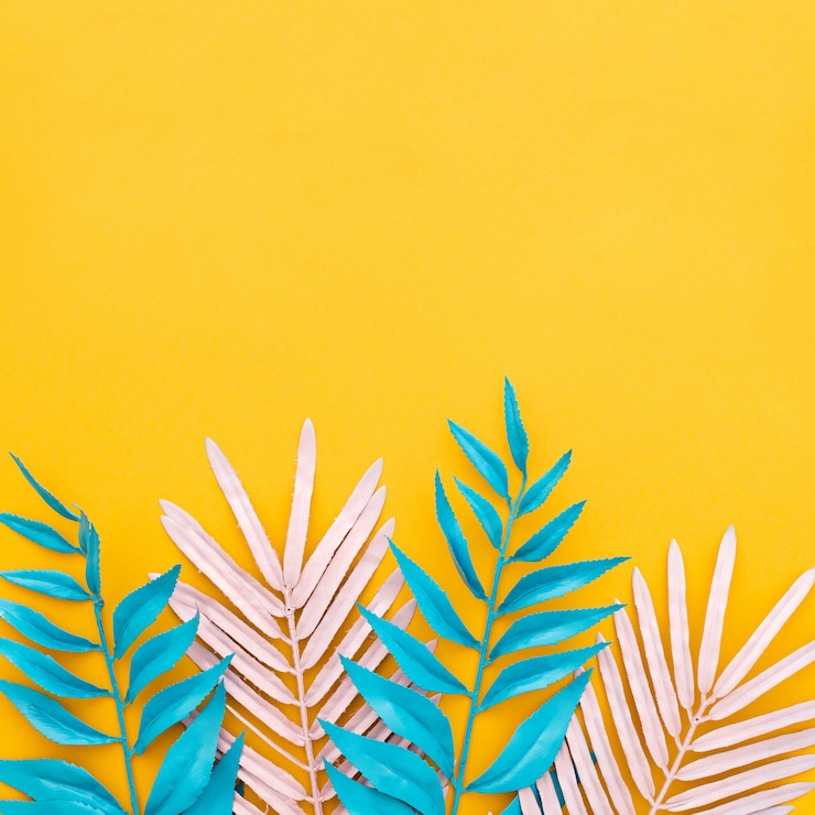 Photo gratuit feuilles tropicales exotiques sur jaune