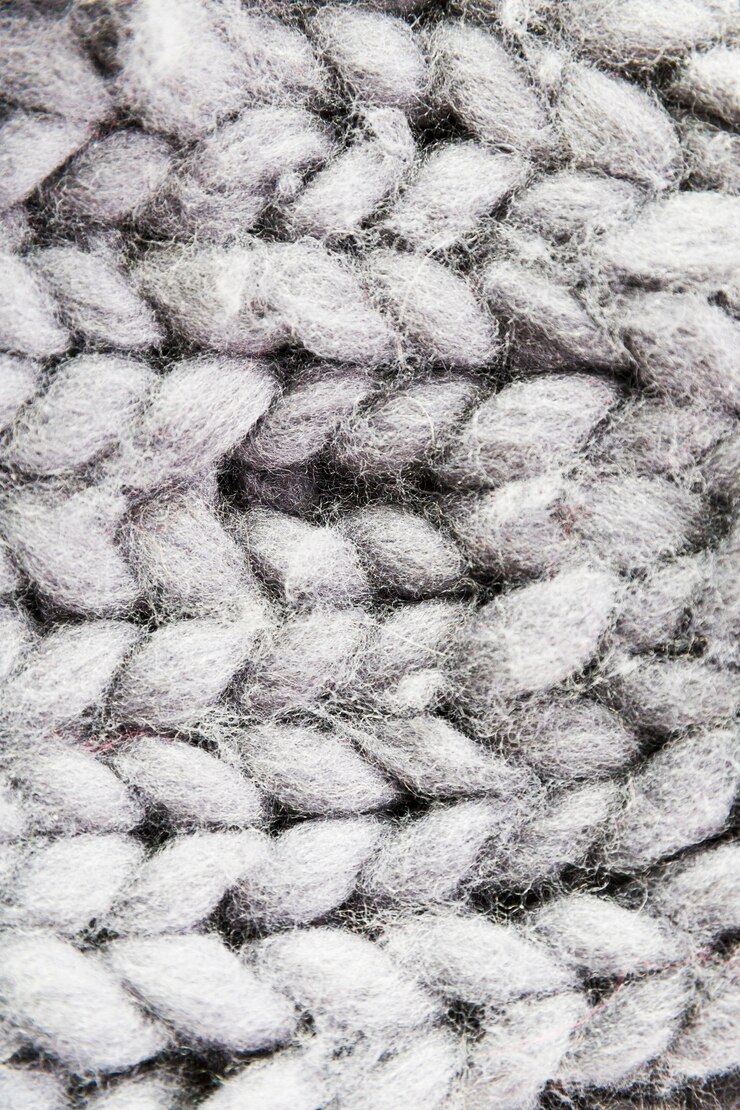 Photo gratuit fibres douces avec motif tricoté