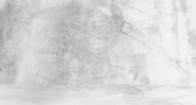 Fond blanc grungy de ciment naturel ou de texture ancienne en pierre comme mur de motif rétro. Bannière murale conceptuelle, grunge, matériel ou construction.