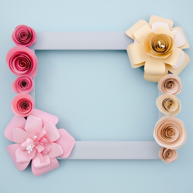 Photo gratuit fond bleu avec cadre de fleurs de papier élégant