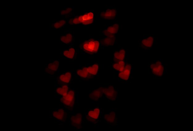 Fond bokeh coeurs rouges