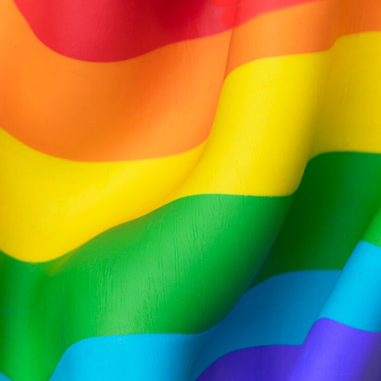 Photo gratuit fond de drapeau arc-en-ciel lgbtq + dans la texture d'argile de pâte à modeler bricolage