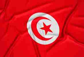 Photo gratuite fond de drapeau tunisien réaliste