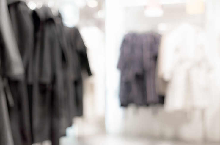 Photo gratuit fond flou - magasin de vêtements