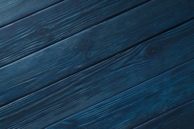 Fond de fond en bois bleu foncé pour différents concepts de fonds en bois