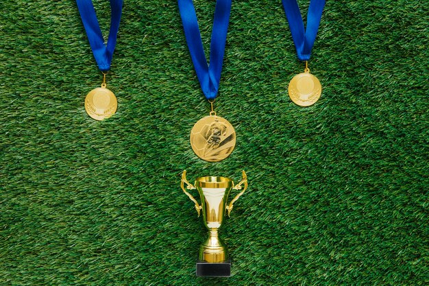 Fond de football avec des médailles et trophée