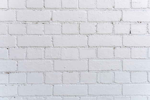Fond de mur en brique blanche