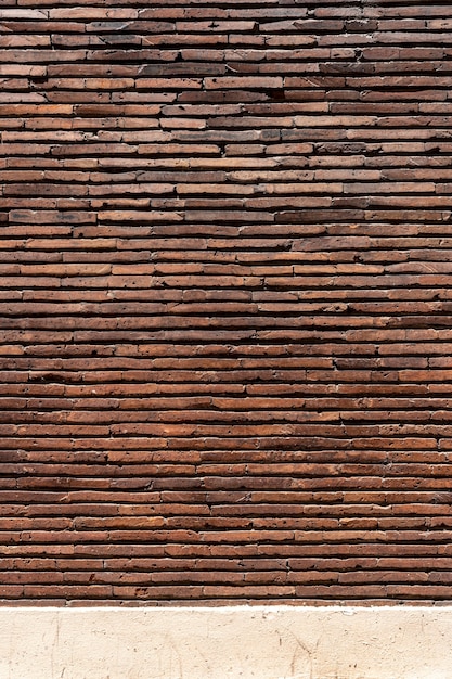 Fond de mur de brique espace copie marron