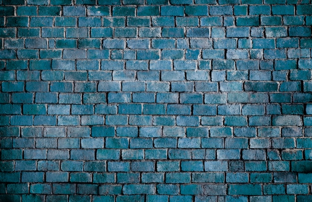 Fond de mur de brique texturé bleu