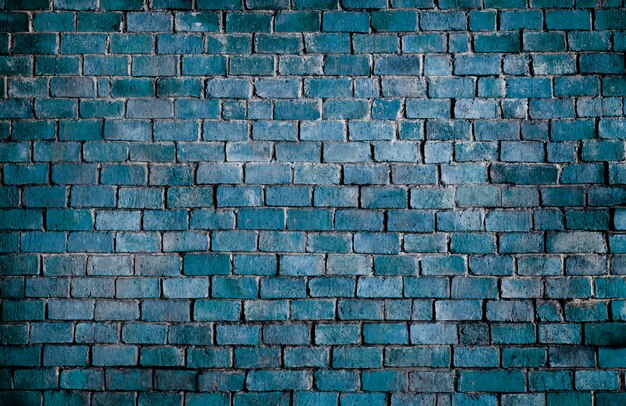 Fond de mur de brique texturé bleu