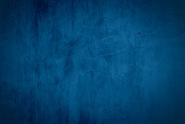 Fond de mur de studio de texture béton bleu grunge vintage avec vignette.