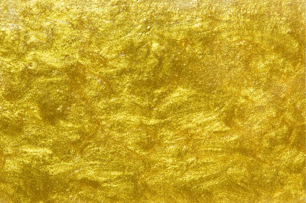Fond de mur texturé peint en or