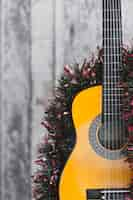 Photo gratuite fond de noël avec guitare