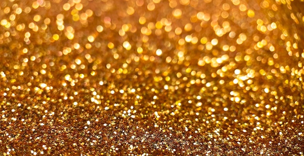 Photo gratuite fond de paillettes d'or avec un effet bokeh