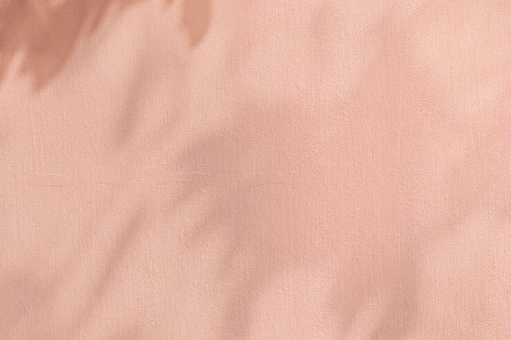 Photo gratuit fond rose ombre avec texture de ciment