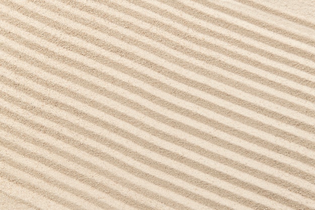 Fond de sable zen rayé dans le concept de santé et de bien-être