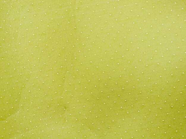 Fond textile vert à pois