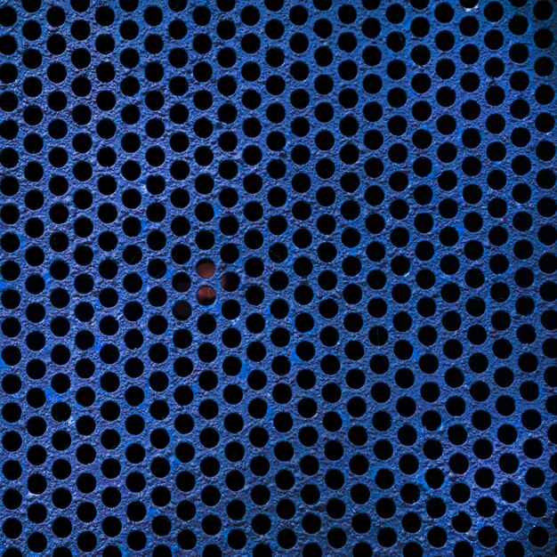 Fond de texture de grille métallique bleu