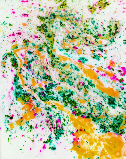 Photo gratuite fond texturé multicolore mélangé avec un liquide