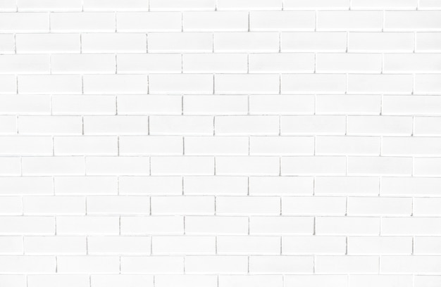Fond texturé mur de briques blanches
