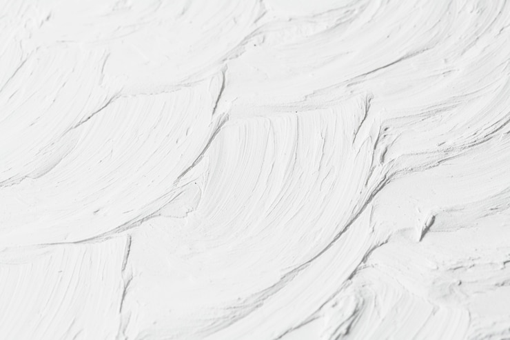 Photo gratuit fond texturé de peinture murale blanche
