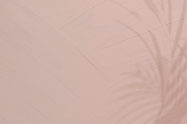Photo gratuite fond de texture de peinture rose terne avec ombre de feuille