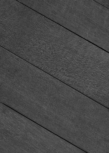Fond texturé de planche de bois noir