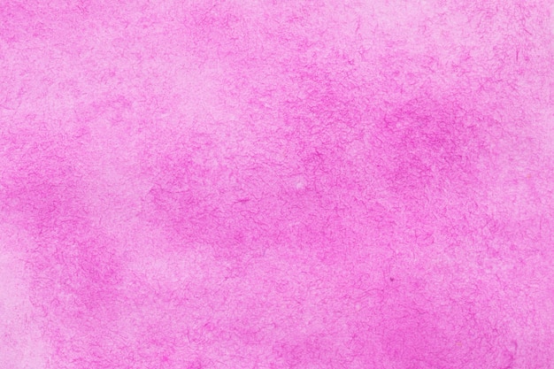 Fond de texture rose aquarelle abstraite macro