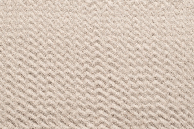 Fond texturé de sable à motifs en zigzag dans le concept de bien-être