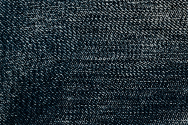 Fond texturé de tapis en tissu bleu