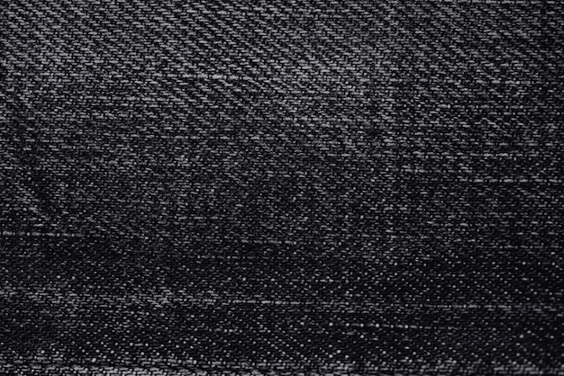 Fond texturé en tissu jeans noir