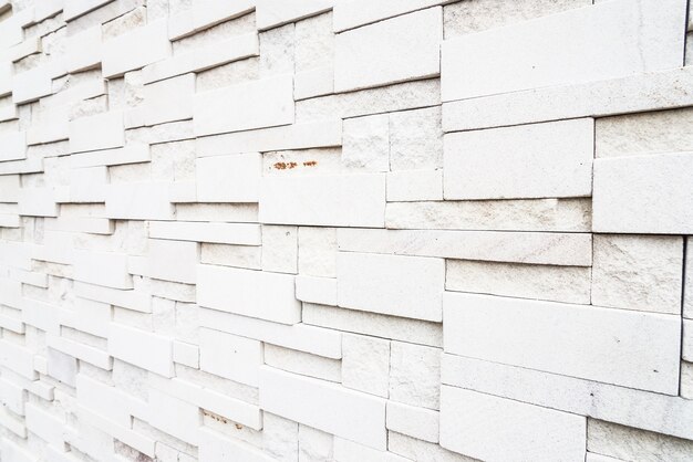 Fond de textures de mur de briques blanches