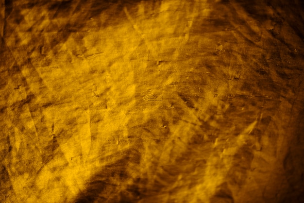 Fond de tissu texturé doré