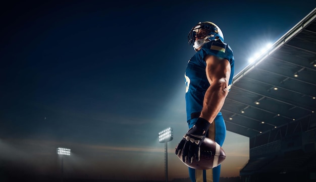 Photo gratuite football américain joueur de football américain dans un stade de sport professionnel