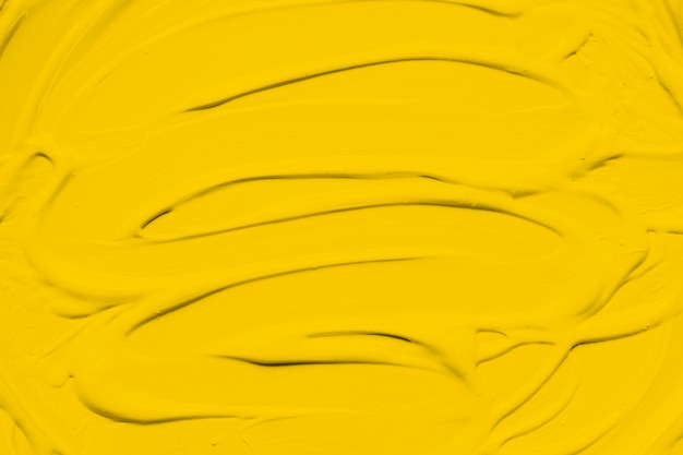 Photo gratuite frottis de peinture jaune vif