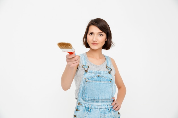 Générateur de femme confiante avec pinceau