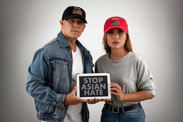 Photo gratuite les gens à tir moyen arrêtent la haine asiatique