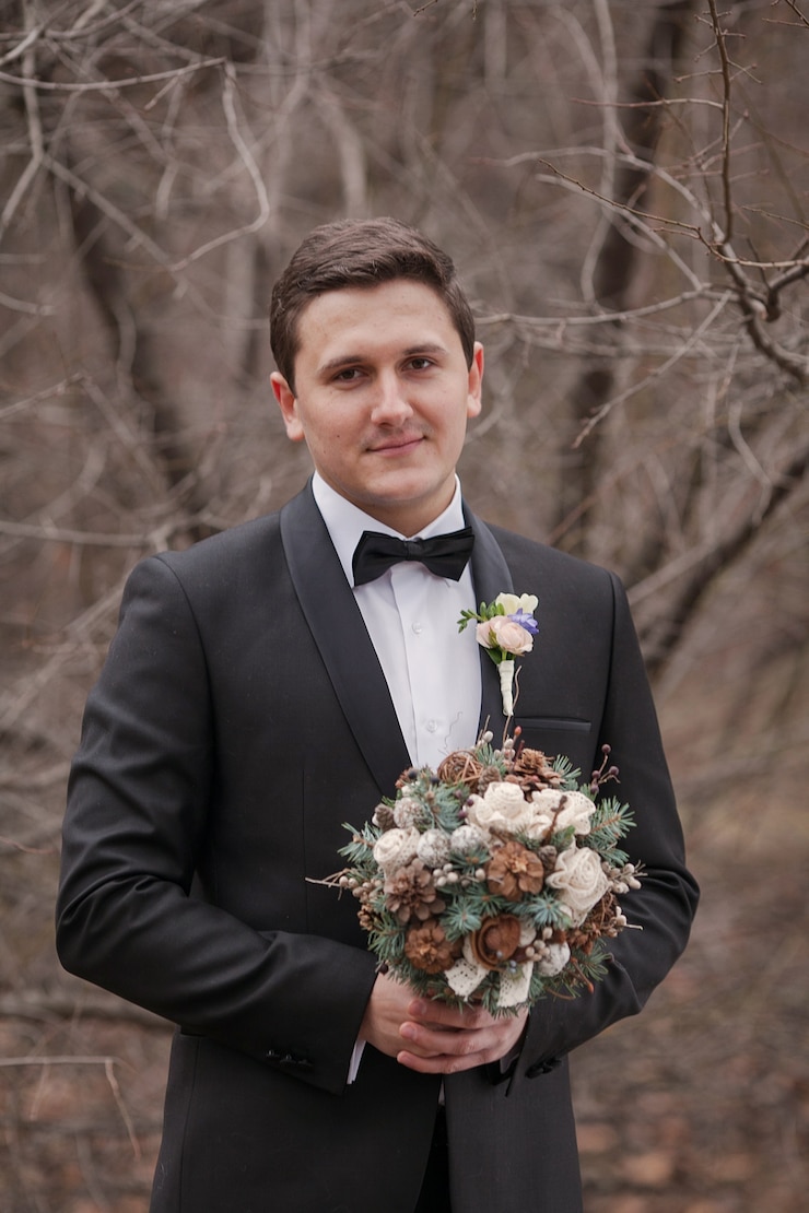 Photo gratuit groom avec un bouquet