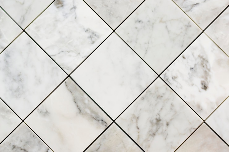Photo gratuit gros plan de carreaux de marbre texturés