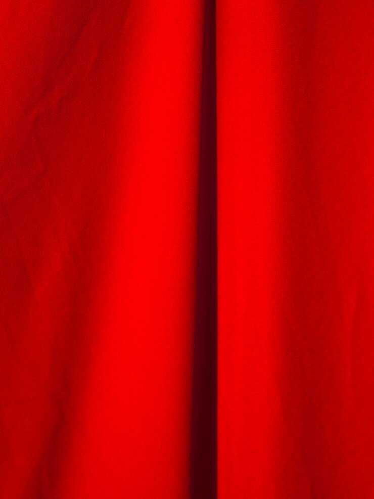 Photo gratuit gros plan du tissu rouge