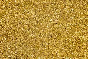 Photo gratuite gros plan de fond texturé de paillettes d'or