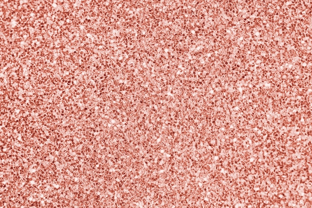 Gros plan d&#39;un fond texturé de paillettes rose