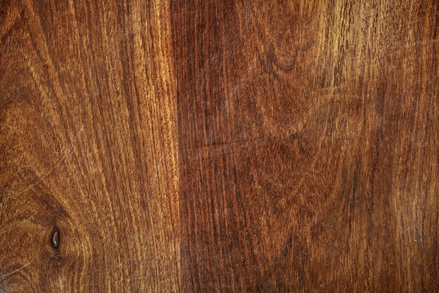 Gros plan d&#39;un fond texturé de plancher en bois marron