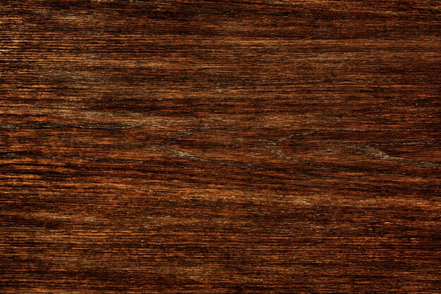 Gros plan d&#39;un fond texturé de plancher en bois marron