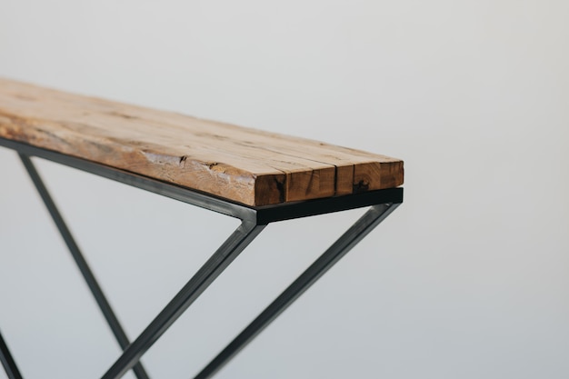 Photo gratuite gros plan d'une planche à repasser faite d'une surface en bois