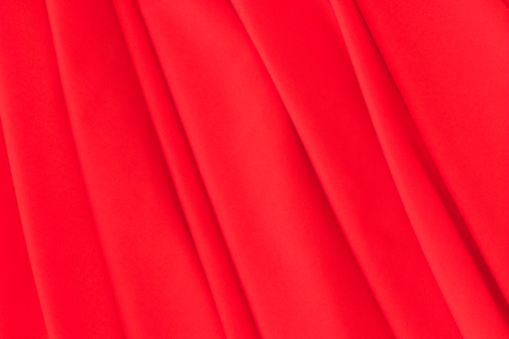Photo gratuit gros plan, de, rouge, plié, tissu, fond
