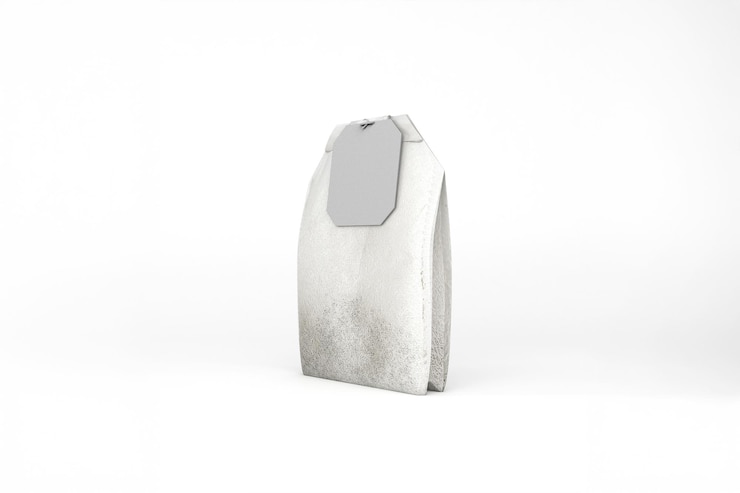 Photo gratuit un gros plan d'un sac de thé isolé sur un fond blanc