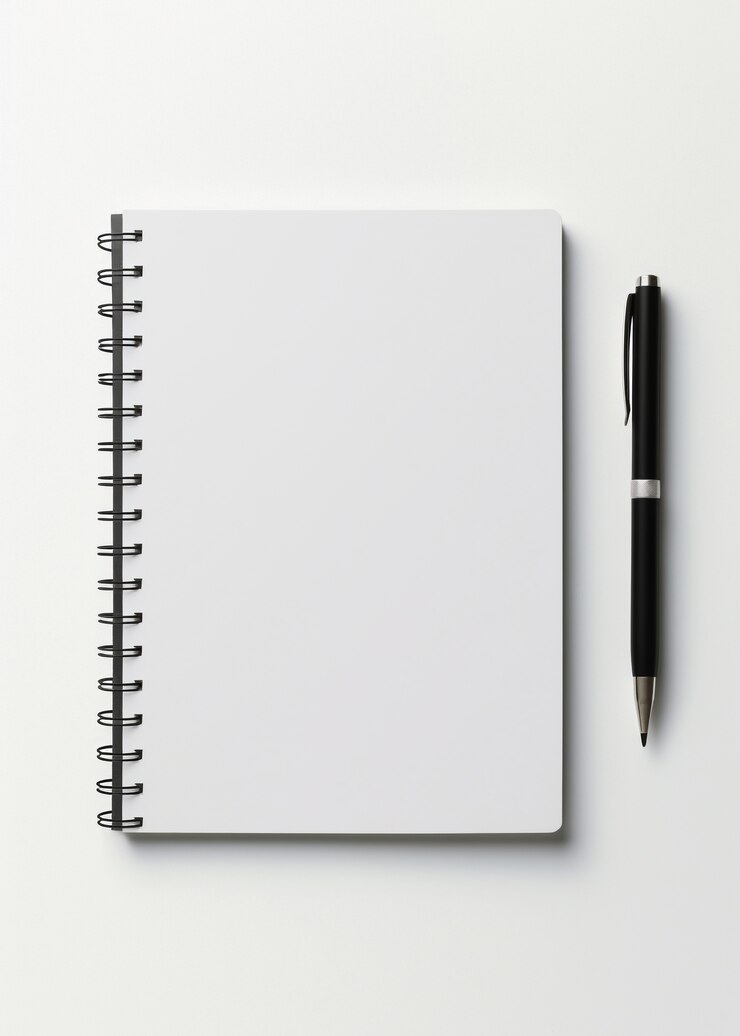 Photo gratuit gros plan sur un stylo avec un carnet