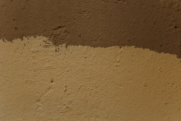 Photo gratuite gros plan de la texture du mur dans les tons marrons